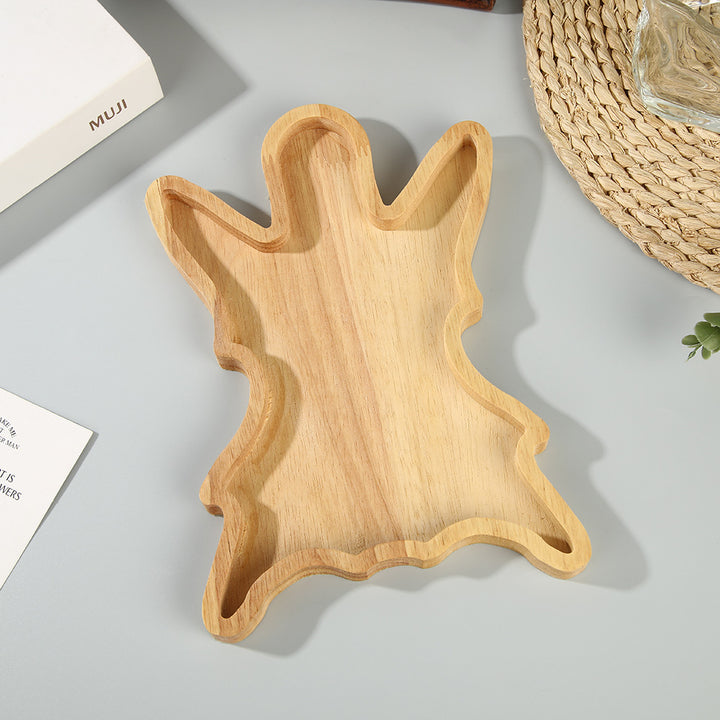 Christmas tree-shaped serving board made of solid wood with carved groove