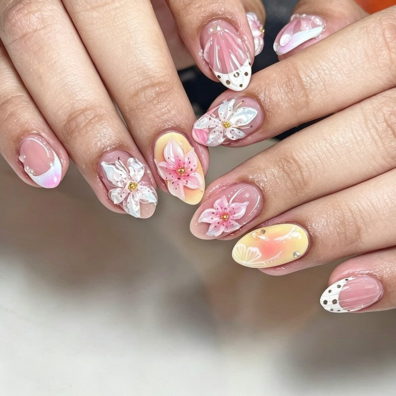 Nail art set with elegant floral design and glitter accents Kalsten