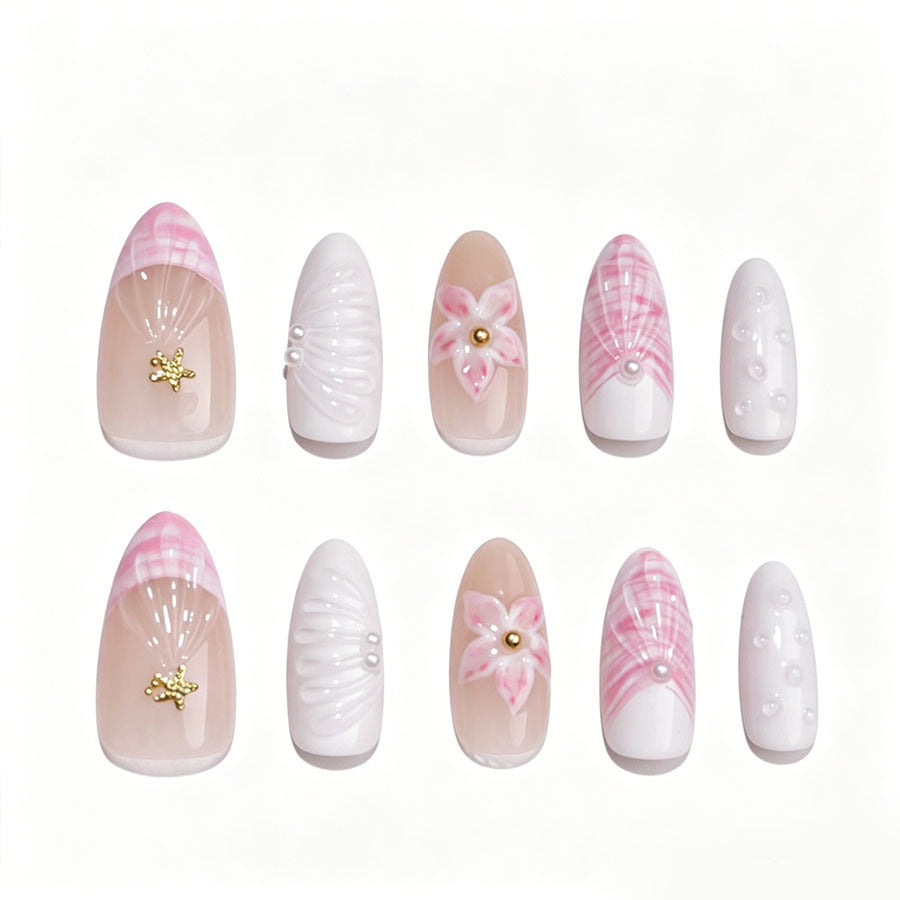 Art nail set with elegant floral decorations and glitter accents Kalsten