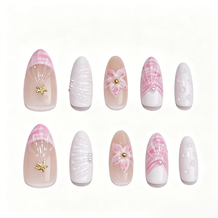 Art nail set with elegant floral decorations and glitter accents Kalsten