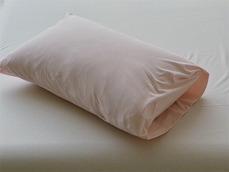 Comfort pillow with breathable cover and shape-retaining filling