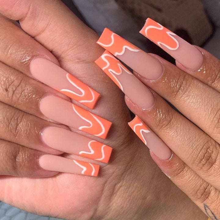 Artful acrylic nails with creative wave design Kalsten