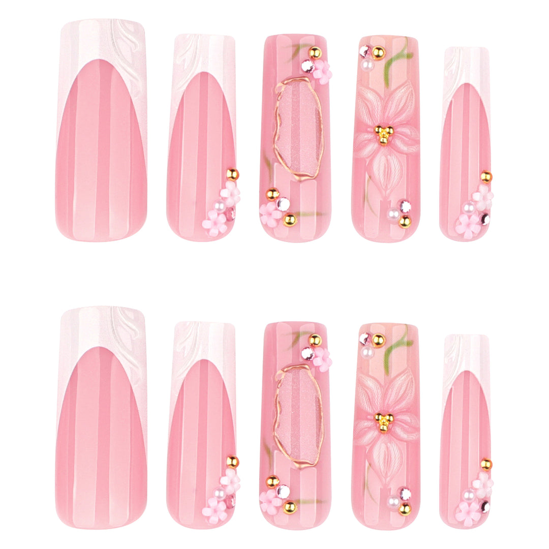 Artful nail extensions with floral embellishments Kalsten