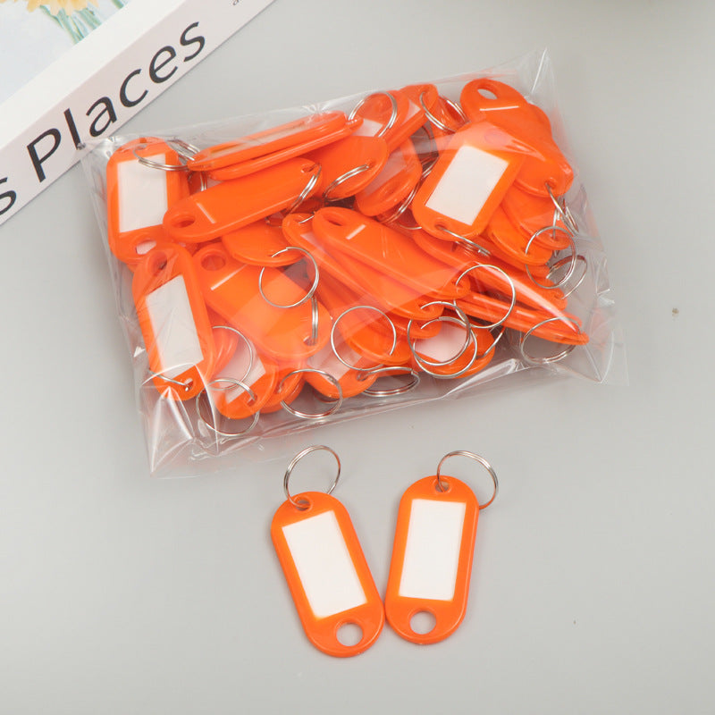 Unisex writable keychain with clear labeling field Kalsten