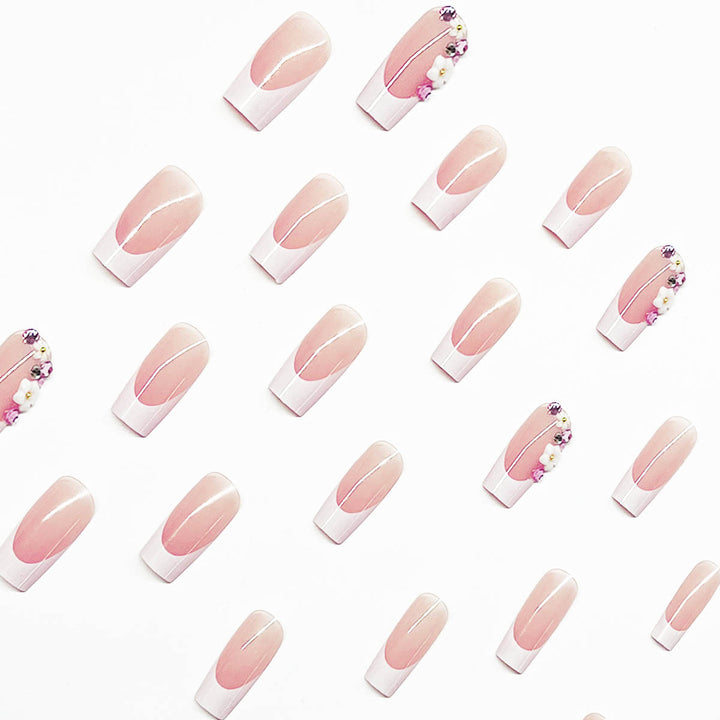 Artificial nail set with elegant floral decorations and transparent finish Kalsten