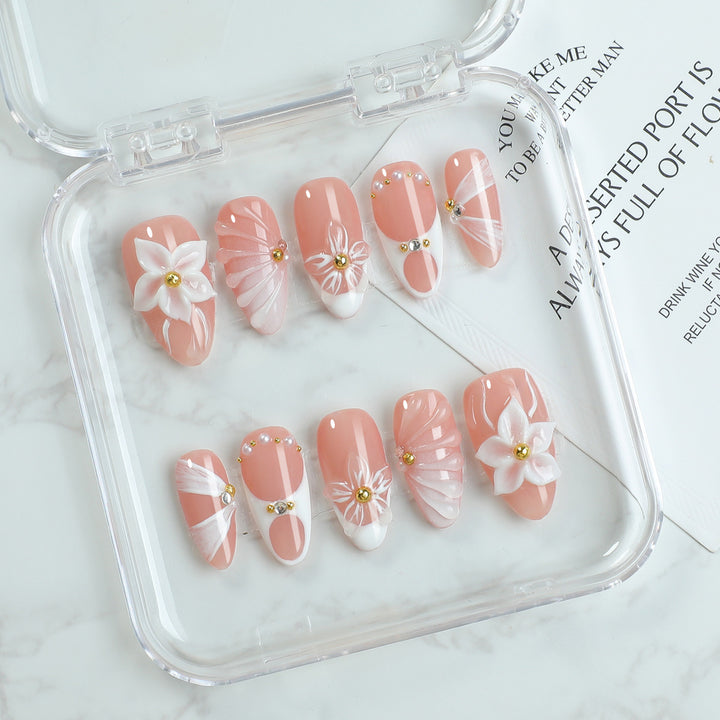 Nail art set with floral decorations and radiant accents Kalsten