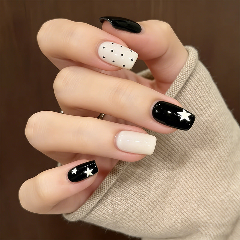 Artistic Press-On Nail Design with Stars and Polka Dots Kalsten