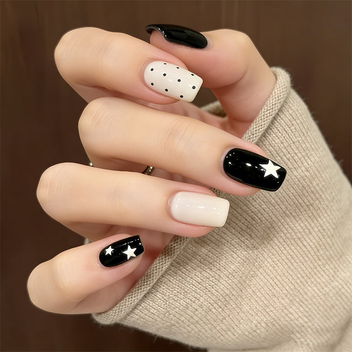 Artistic Press-On Nail Design with Stars and Polka Dots Kalsten