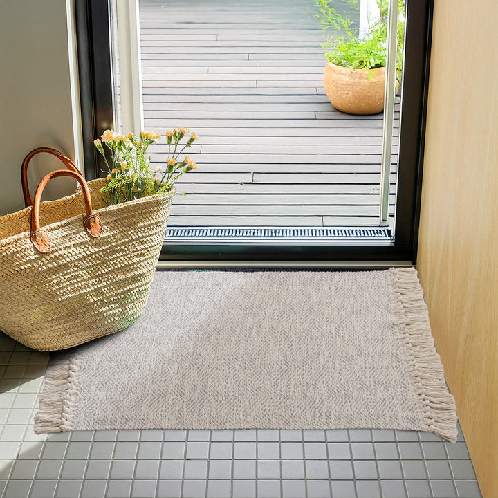 Braided runner rug with herringbone pattern and fringe edge Kalsten