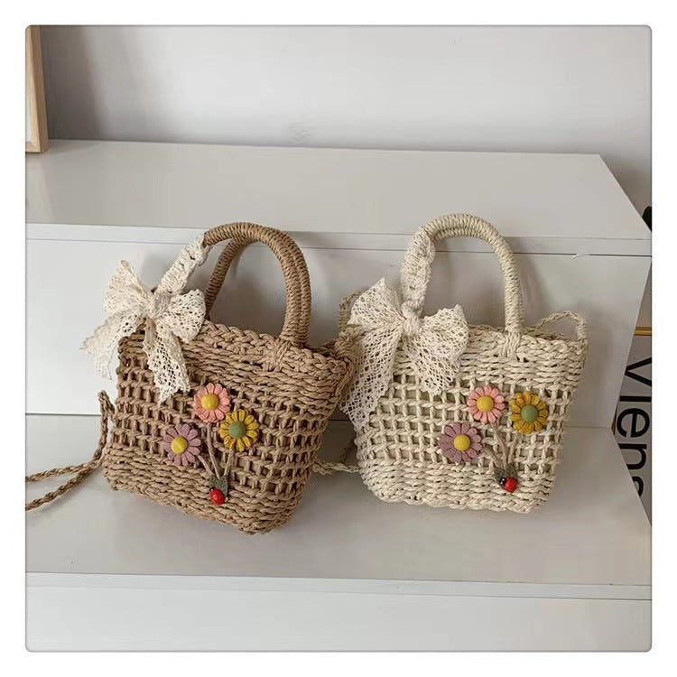 Playful basket bag with floral appliqués Kalsten