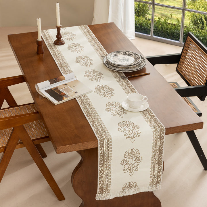 Woven decorative table runner with floral medallion borders and fringes Kalsten