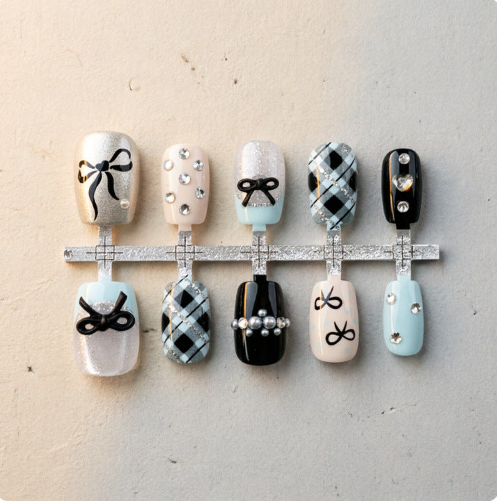 Artificial nails with elegant bows and rhinestones Kalsten