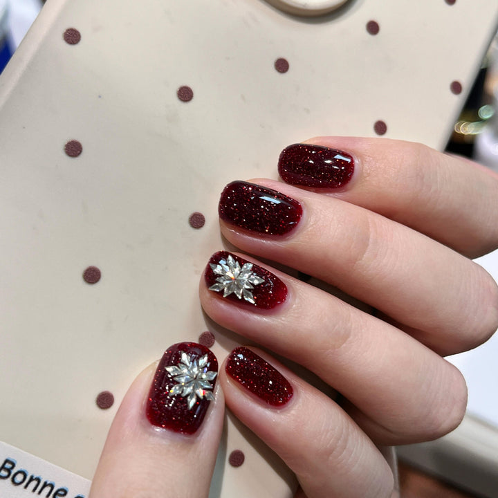 Glamorous artificial nails with rhinestone applications Kalsten