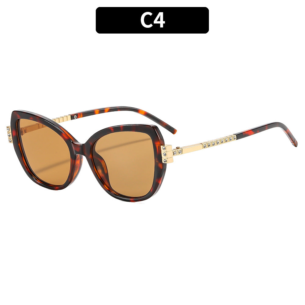 Elegant Cat-Eye Sunglasses with Decorative Gold Accents