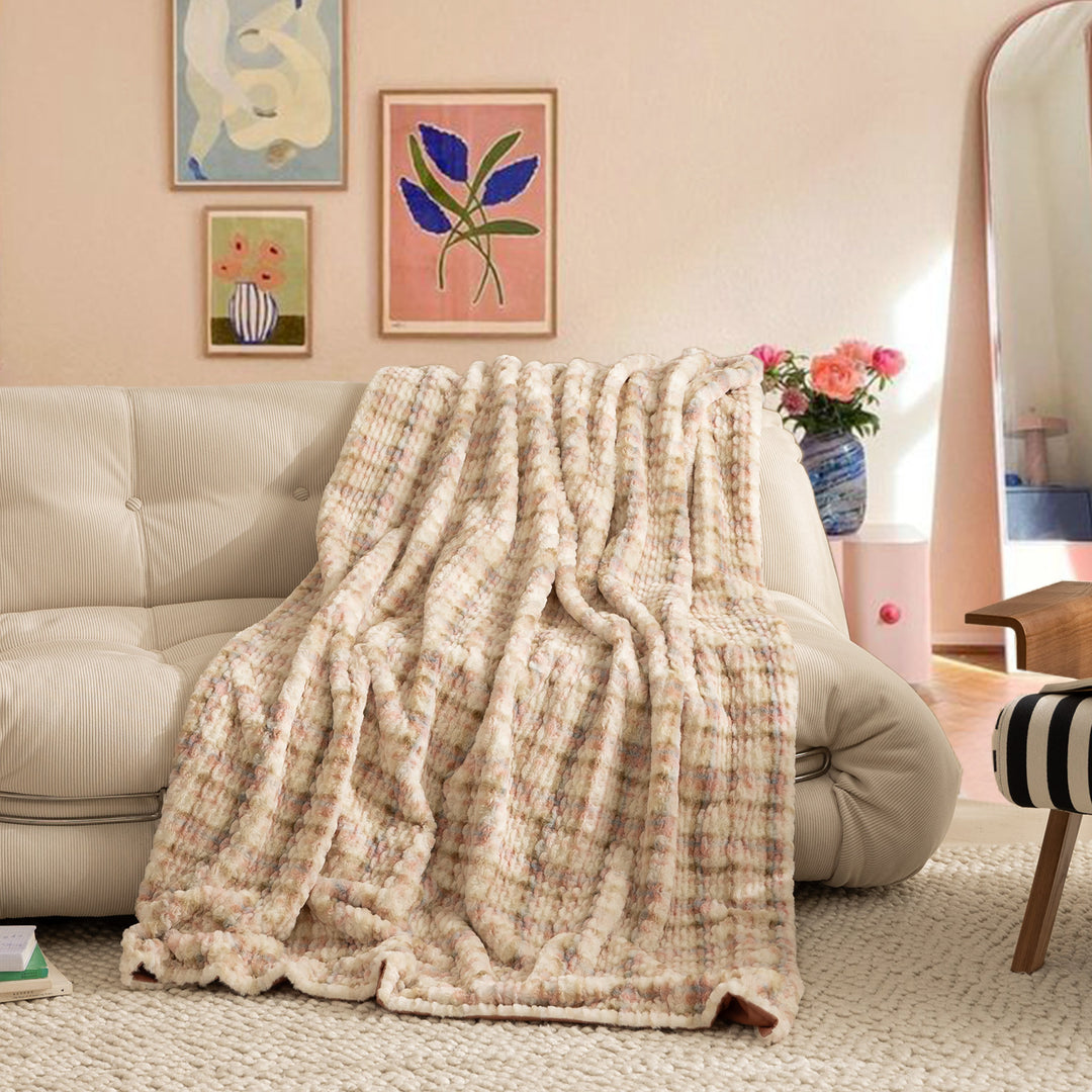 Cozy blanket made of luxurious synthetic fur with wavy texture and soft microfiber back Kalsten