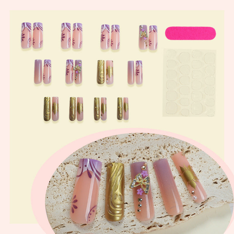 Artificial nail set with delicate flower and glitter accents Kalsten
