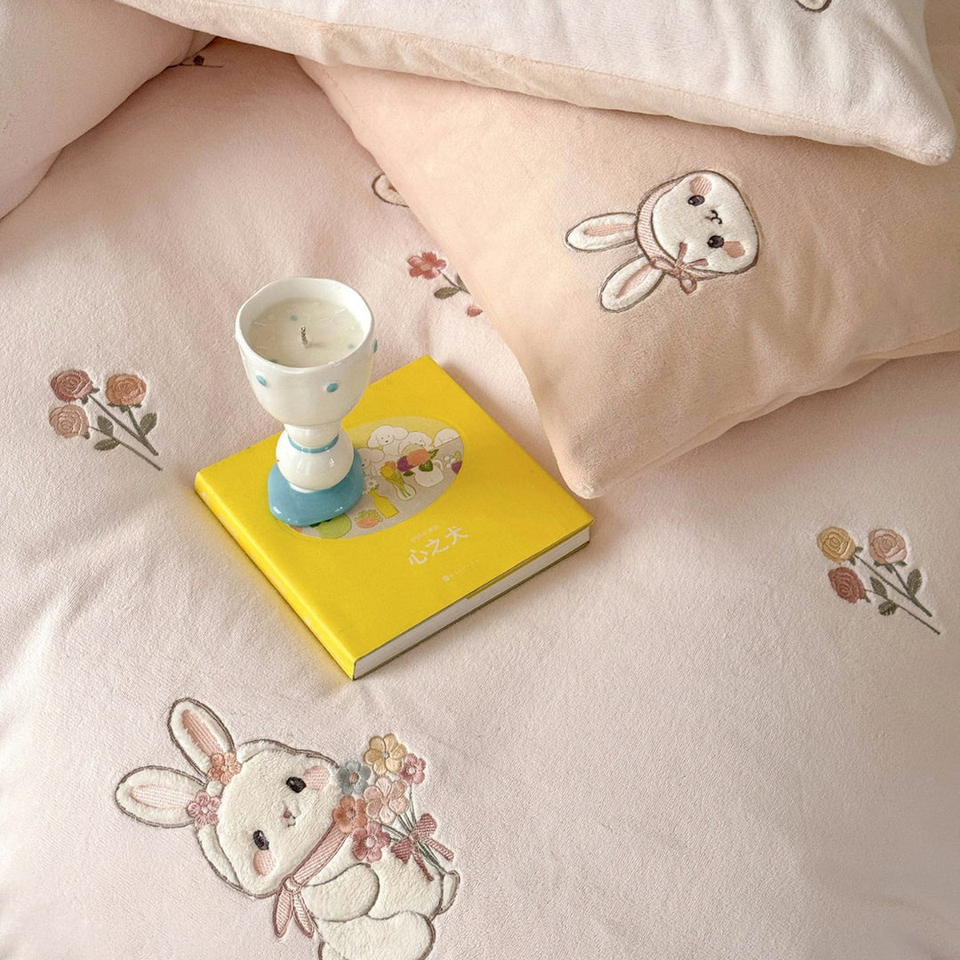 Cute children's bedding set made of soft cotton terry with embroidered cat appliqués and cuddly plush pillow.
