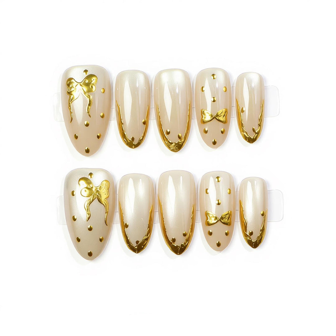 Elegant Press-On Nail Art with Golden Bow Accents Kalsten
