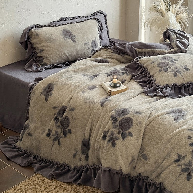 Microfleece bedding set with floral velour relief and decorative trim