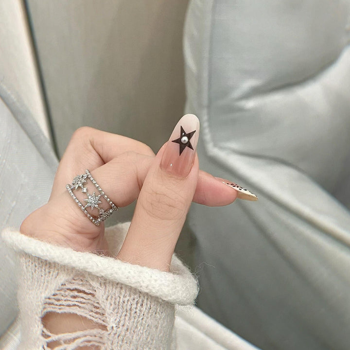 Artificial Nail Design with Festive Star Motif Kalsten
