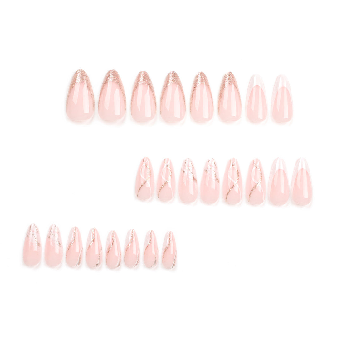 Artful stiletto nails with elegant marble and glitter design Kalsten