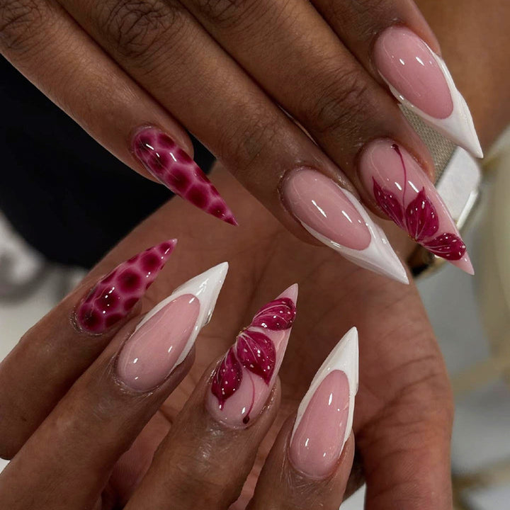 Artificial nail creations with creative patterns and glitter accents Kalsten