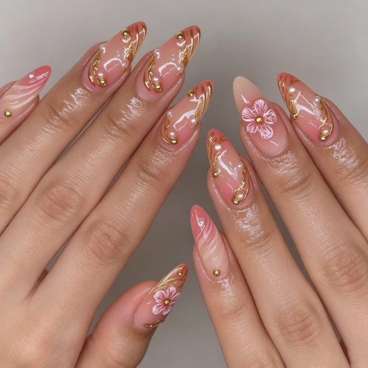 Artificial nails with floral decorations and gold accents Kalsten