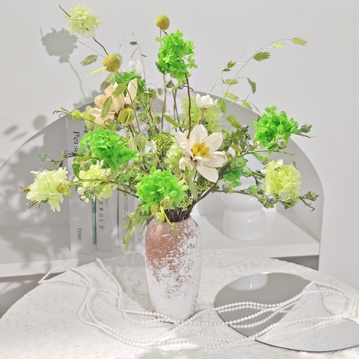 Lively Floral Arrangement in Decorative Ceramic Vase