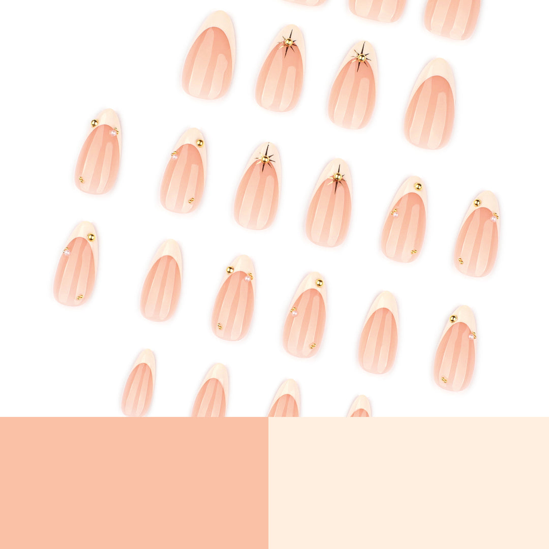 Artistic French-tip nail art with glitter and elegant embellishments Kalsten