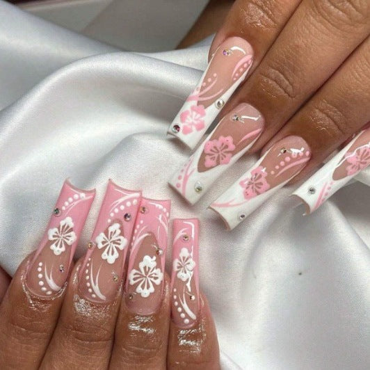 Art nail set with elegant flower design and crystal embellishments Kalsten