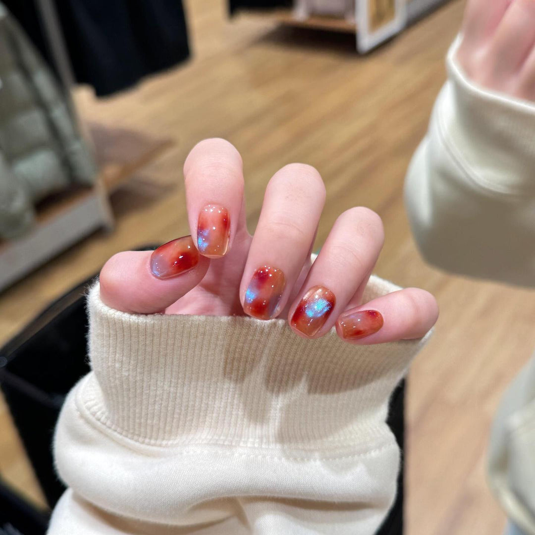 Artificial nails with shimmering galaxy patterns Kalsten
