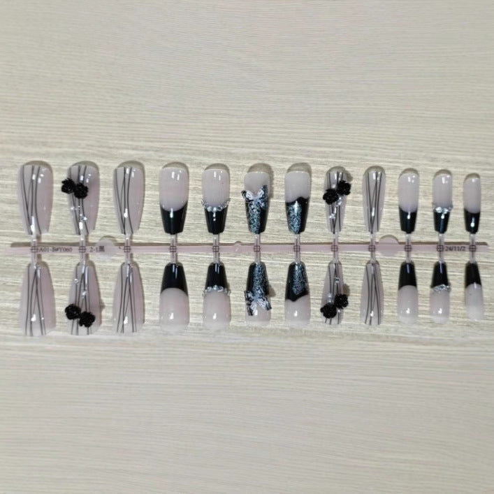 Elegant nail design with bow and rhinestone details Kalsten
