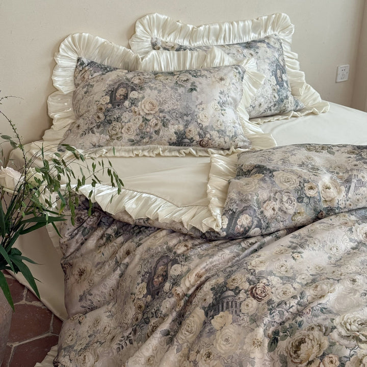 Romantic satin bedding set with floral jacquard look and gathered ruffle