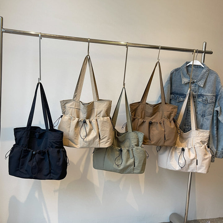 Practical everyday handbag with drawstring Kalsten