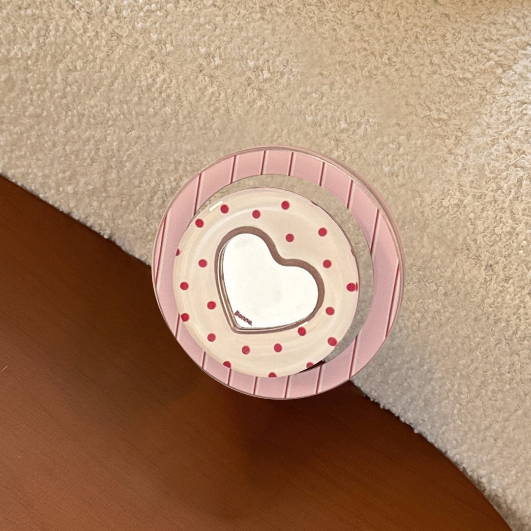 Heart-shaped coaster with playful design Kalsten