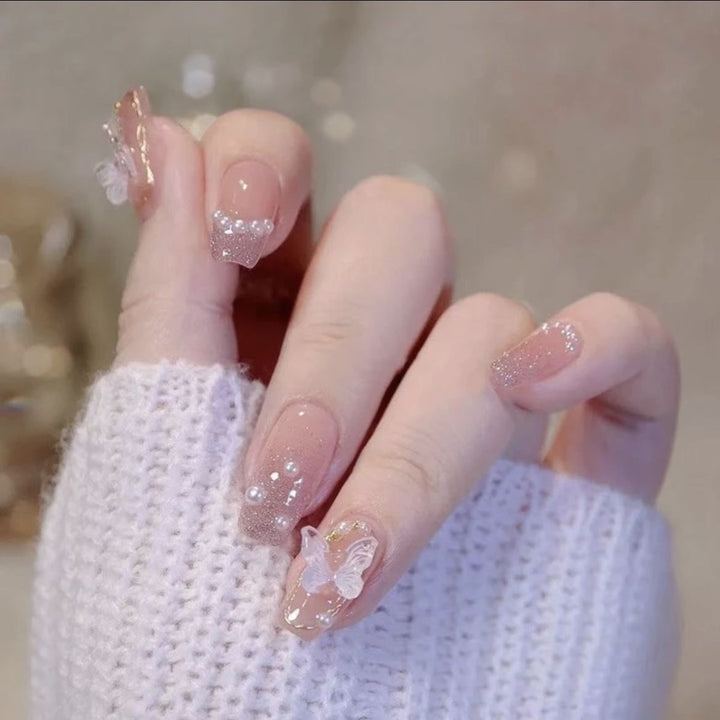 Artistic Nail Art with Glitter and Flower Applications Kalsten