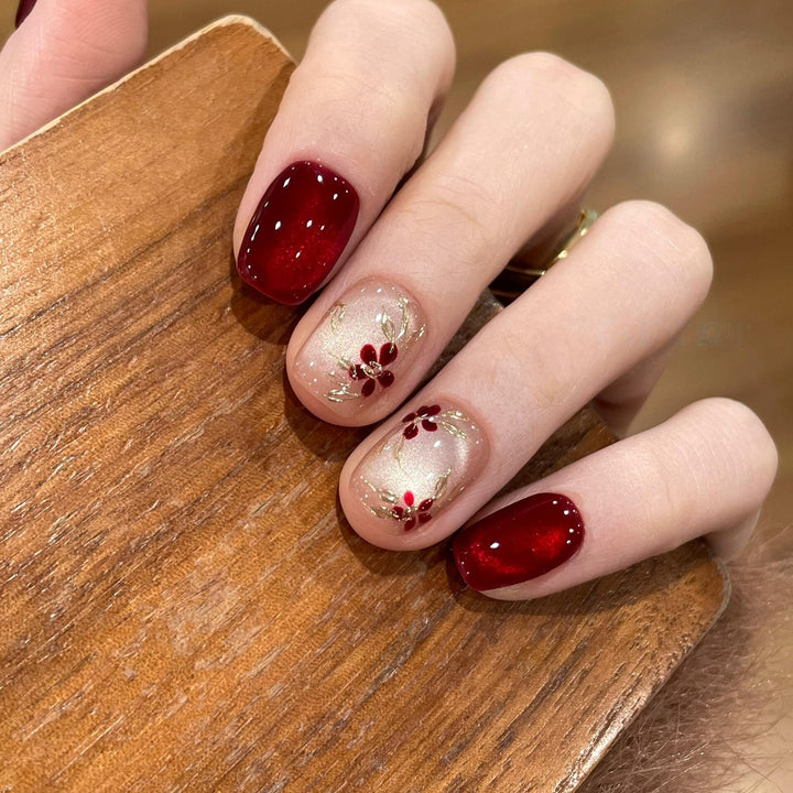 Artificial nails with elegant floral and glitter designs Kalsten