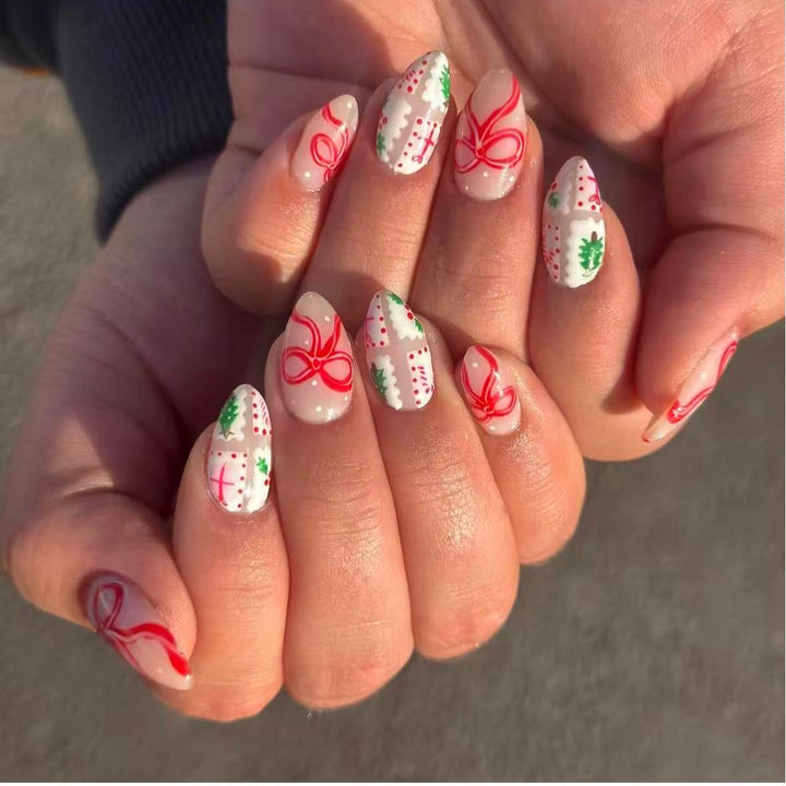 Artificial nail set with festive gift and bow motifs Kalsten