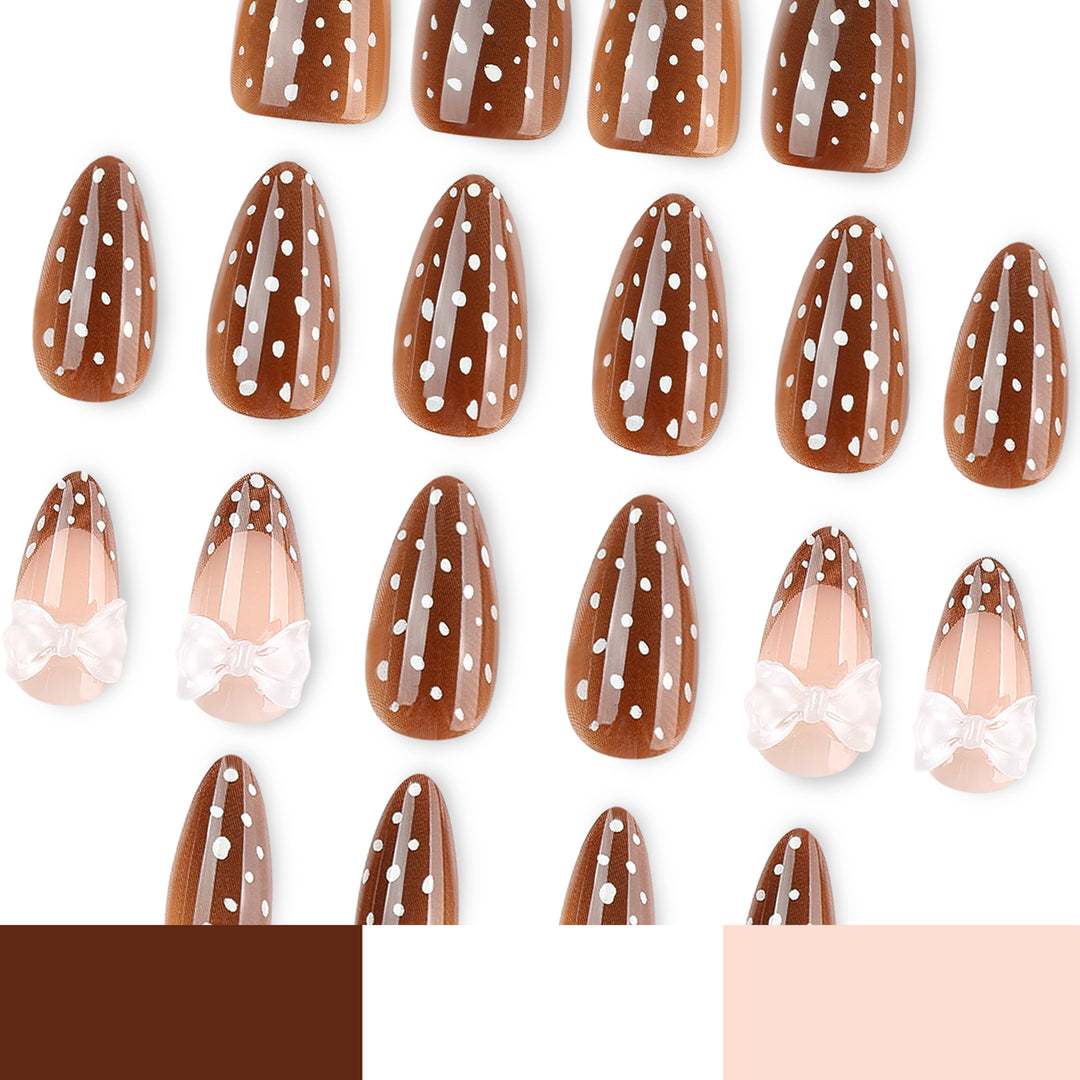 Artistic stiletto nails with delicate bow motif Kalsten