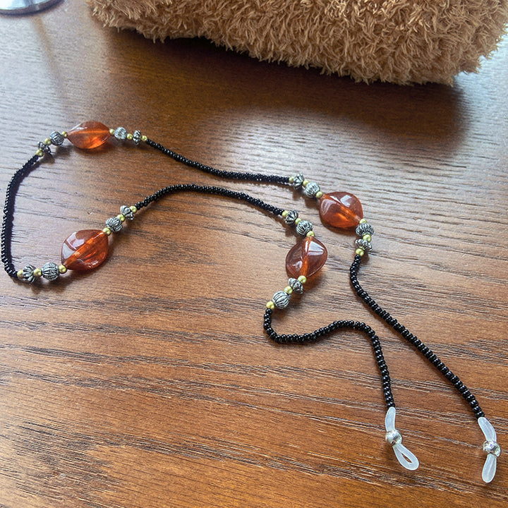 Stylish glasses holder chain with colorful accents Kalsten