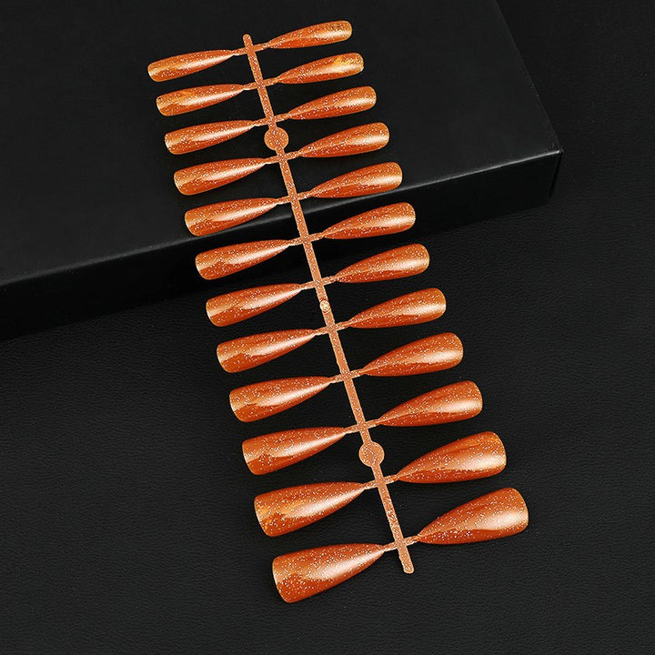 Glittering artificial nails in elegant design Kalsten