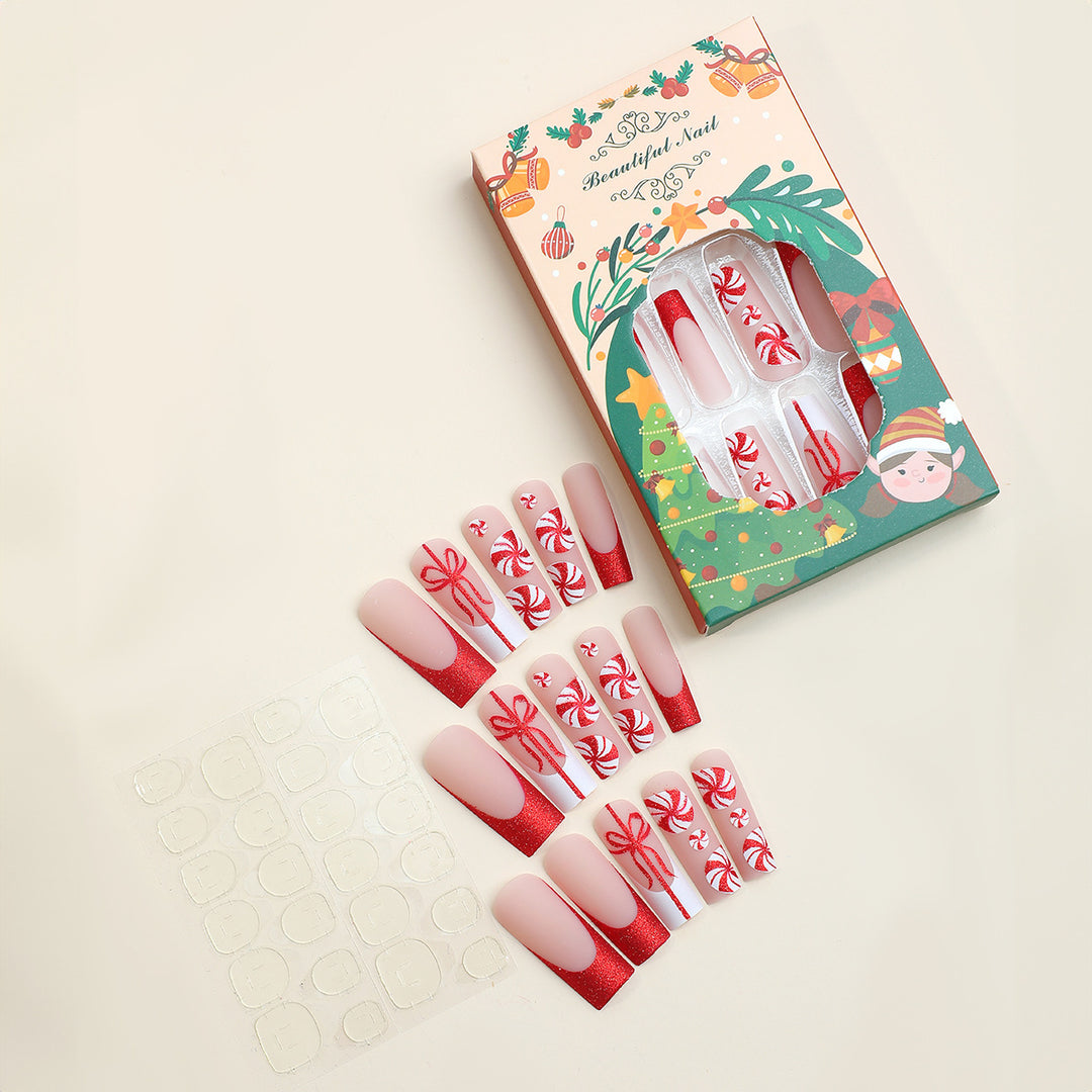 Artificial nail set with festive candy cane design and glitter accents Kalsten