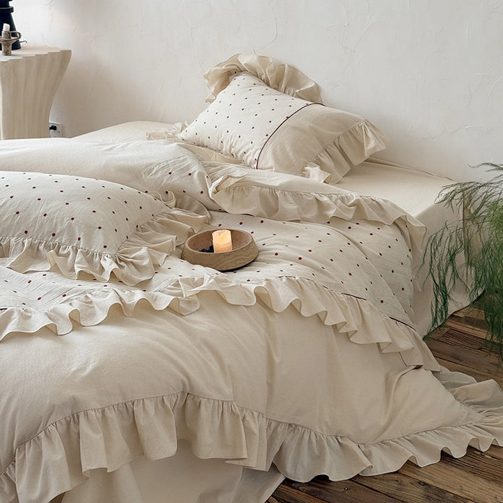 Duvet cover set with ruffle, embroidered dots, and stonewashed cotton finish