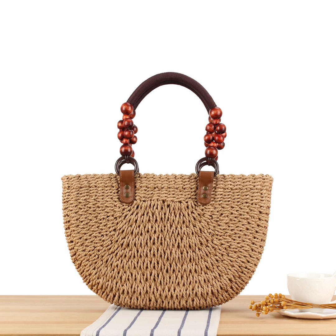 Basket bag with elegant wooden handles and textured surface Kalsten