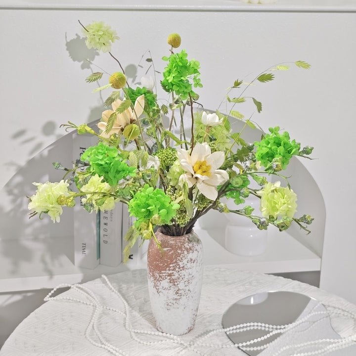 Lively Floral Arrangement in Decorative Ceramic Vase