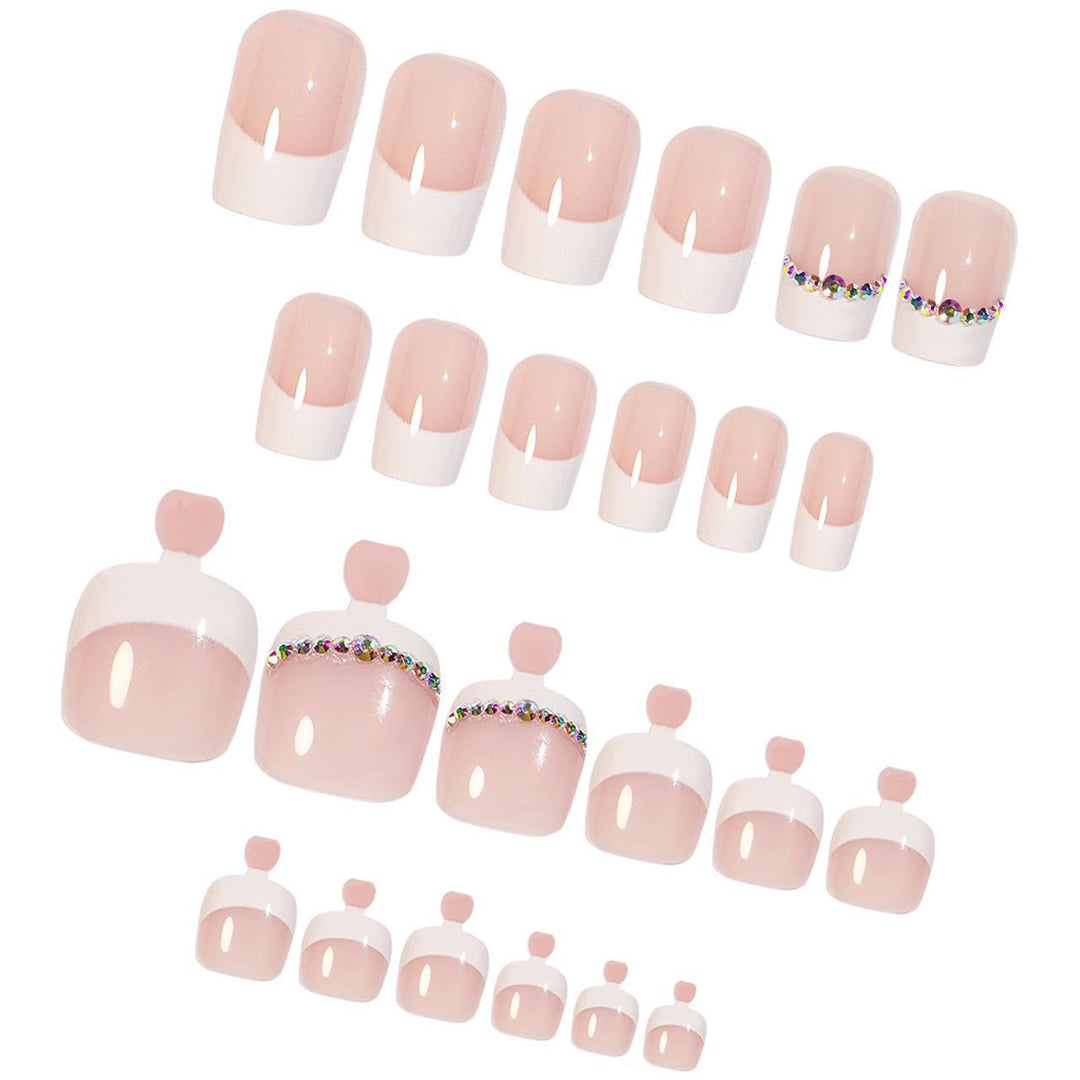Acrylic nail set with elegant French design and rhinestone embellishments Kalsten
