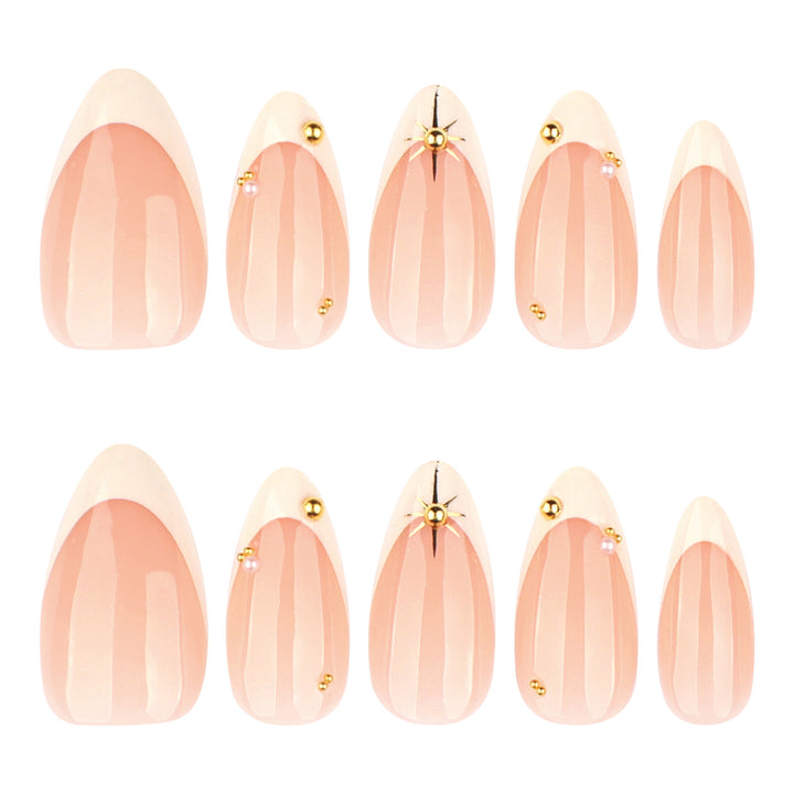 Artistic French-tip nail art with glitter and elegant embellishments Kalsten