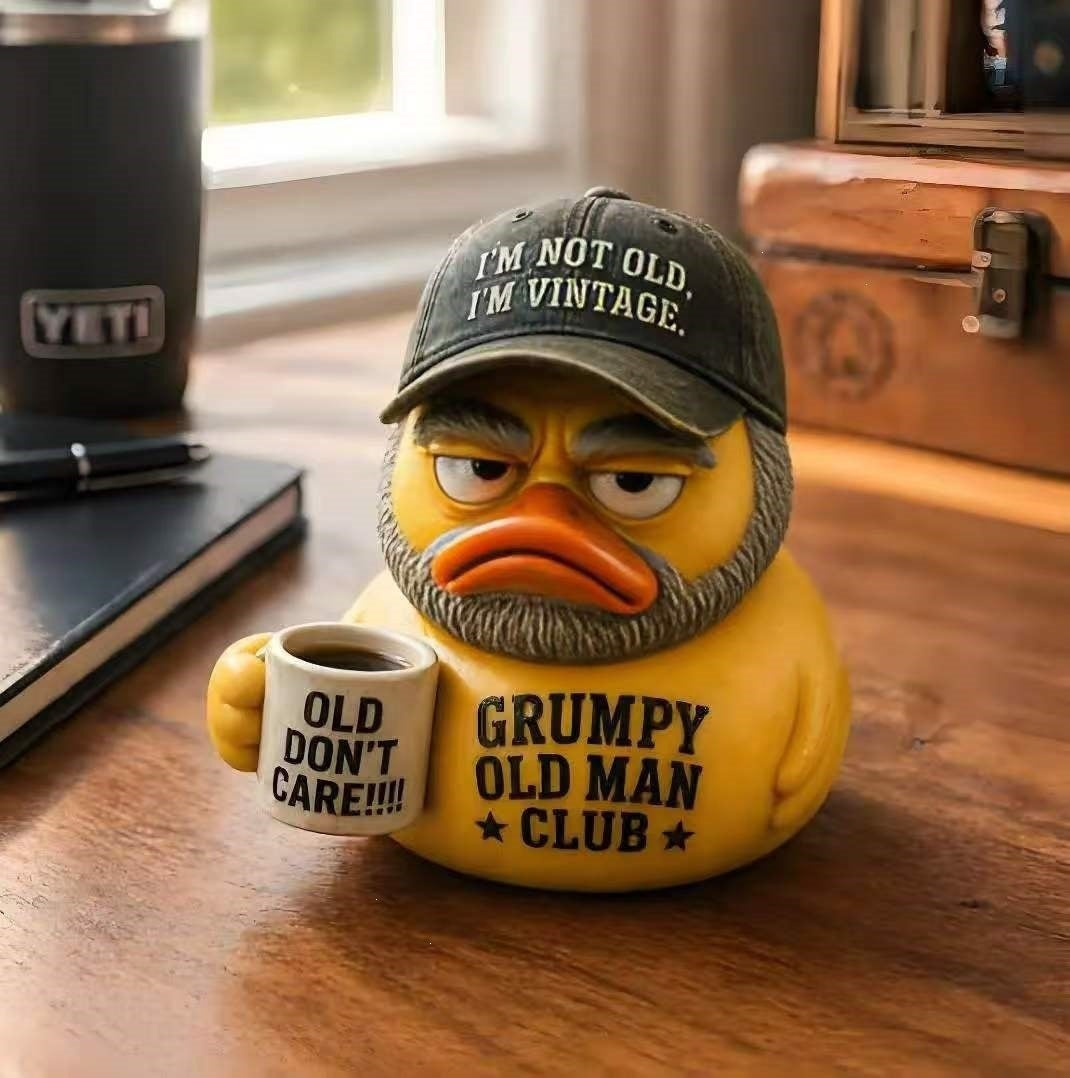 Funny rubber duck with vintage hat and cup Kalsten