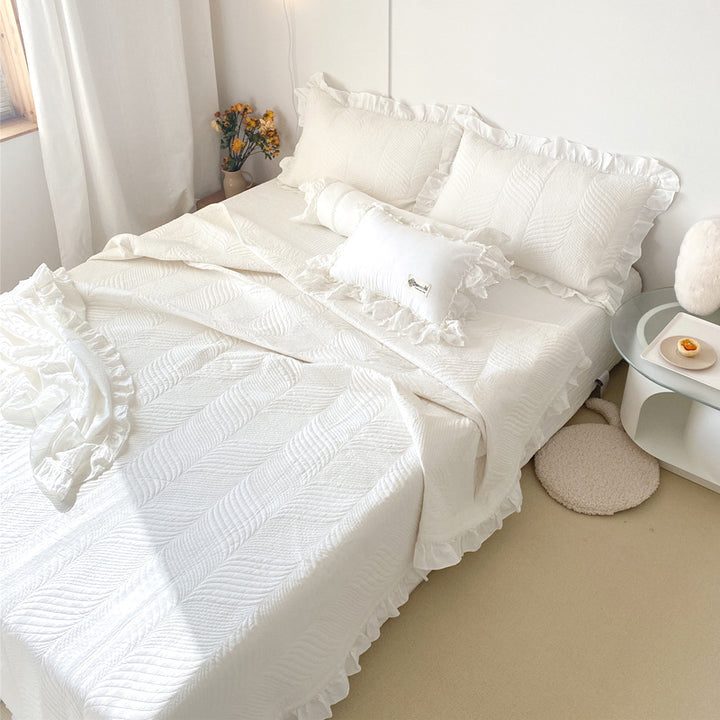 Quilted bedspread set with ruffle and embossed leaf quilting