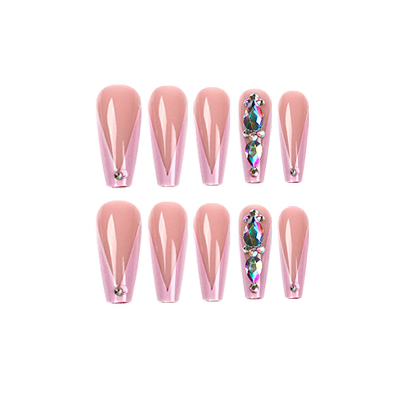 Artful nail extensions with rhinestone and flower accents Kalsten